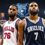 Basketball players stand back-to-back at court with 76ers jersey and Grizzlies navy blue attire and city lights.