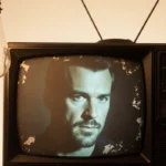 Worn TV screen showing Luke Spencer