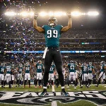 Jalen Carter blocks a Bills extra point with Eagles bench cheering behind