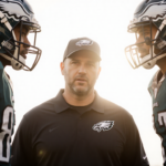 Coach Nick Sirianni is conversing with Landon Dickerson and Fred Johnson in a circular formation, surrounded by natural light