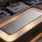 SN Operator device rests inside vintage SNES cartridge case with warm glow and retro console backdrop