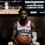 Tyrese Maxey holding a basketball with a determined look while locker room TVs show fan votes and Giannis Antetokounmpo