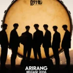 BTS members stand together before a giant Korean drum with Seoul skyline glowing behind them and album details below