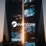 Two skyscrapers merge into one at dusk with golden light and digital screens showing engagement metrics