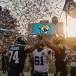 Jaguars players high‑fiving each other on the field with confetti and balloons and a sunset‑lit stadium full of cheering fans