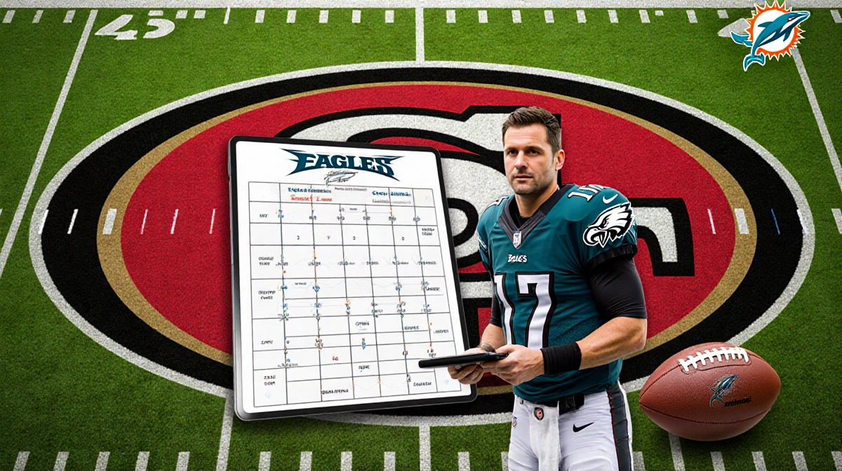 Mike McDaniel stands with Kyle Shanahan on 49ers field holding tablet showing zone scheme with Dolphins logo visible