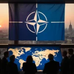 NATO flag waves above city rooftops with officials gathered around world map showing concern