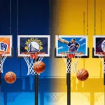 Four basketball hoops stand side by side with NBA team logos and three basketballs hanging from the ropes against a blue to g
