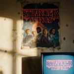 Faded Stranger Things poster peeling with nostalgic suburban wall and flickering TV screen showing logo.