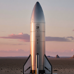 Silver Starship rocket stands proudly on launchpad with sunset glow and desert horizon.
