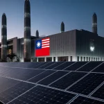 Futuristic semiconductor plant rises at dusk with American flag and solar panels showing Taiwan