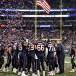 Texans defense celebrating victory with confetti falling and dejected Steelers quarterback standing alone